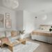 Cozy 400 square foot studio apartment for a couple with sofa and bed sharing one open room