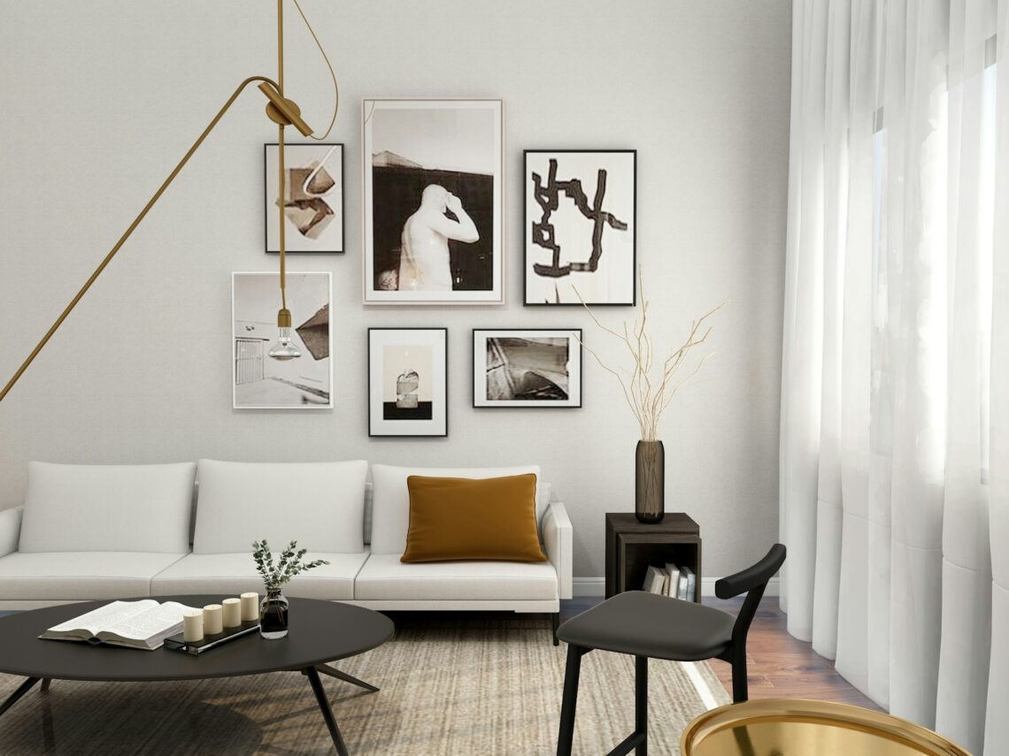 modern small apartment living room with a gold brass arc floor lamp sweeping over a white sofa